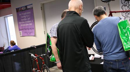 image of f-new-york-city-bicycle-trade-show-gran-fondo-iride-bicycles-urban-riding-specialists-high-performance-street-speed-artisanally-made-bikes-by-hand-show-with-curious-participants
