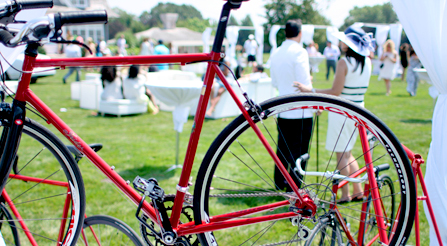 image of Party guests enjoying the glow of high performance Italian bicycles